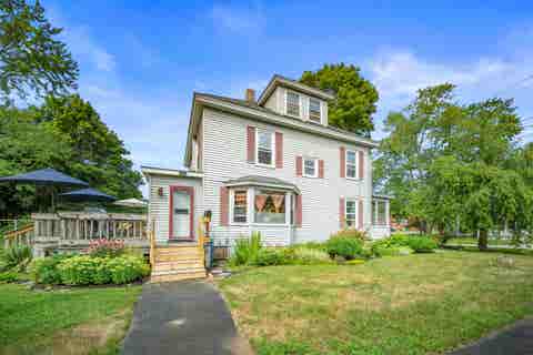 Photo of 13 Railroad Avenue, Rochester, NH 03839 (MLS # 5104947)