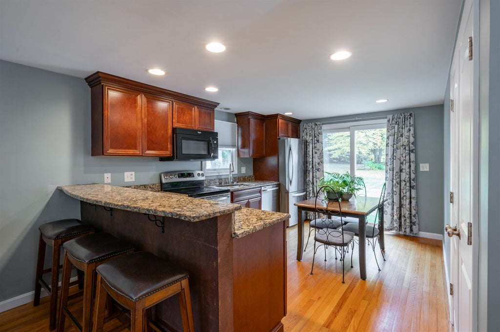 Photo of 19 Sanders Road, Hudson, NH 03051 (MLS # 5114769)