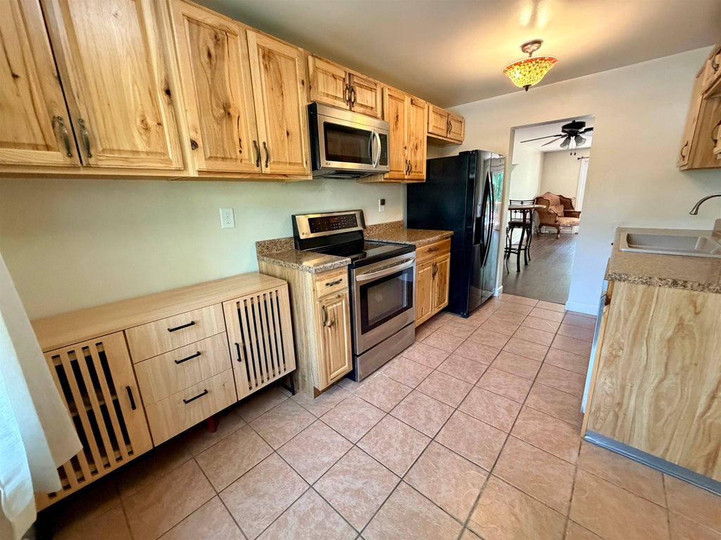 Photo of 208 Bartemus Trail, Nashua, NH 03063 (MLS # 5098469)