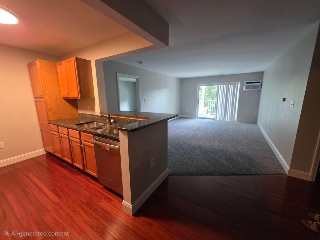 Photo of 265 Edward J Roy Drive #320, Manchester, NH 03104 (MLS # 5109376)