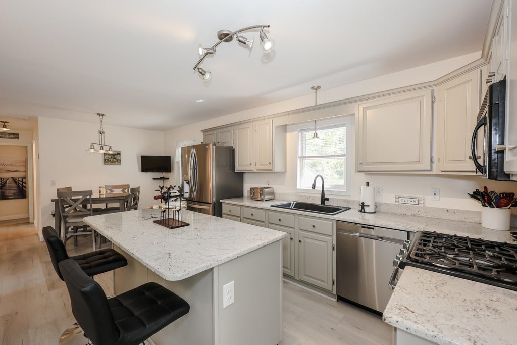 Photo of 39 Lily Pond Road, Alton, NH 03809 (MLS # 5105614)