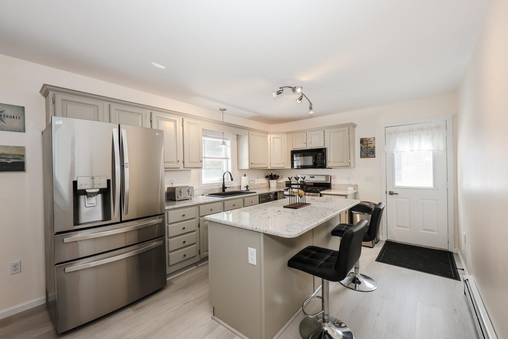 Photo of 39 Lily Pond Road, Alton, NH 03809 (MLS # 5105614)