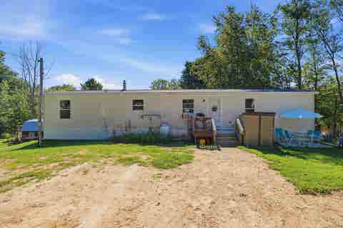 Photo of 35 Thompson Road, Pittsfield, NH 03263 (MLS # 5105952)