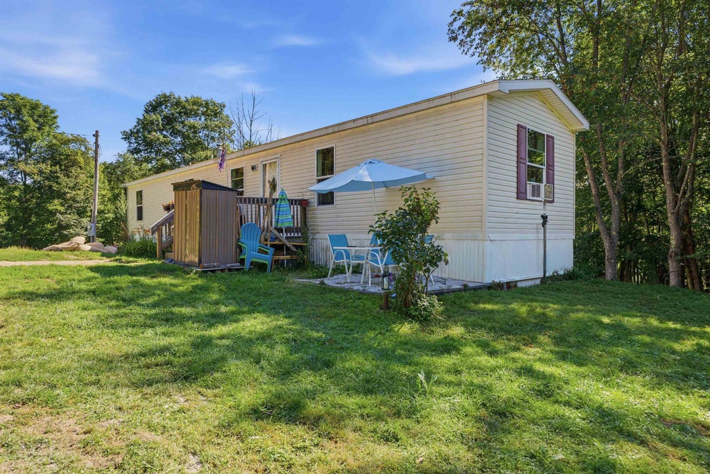 Photo of 35 Thompson Road, Pittsfield, NH 03263 (MLS # 5105952)