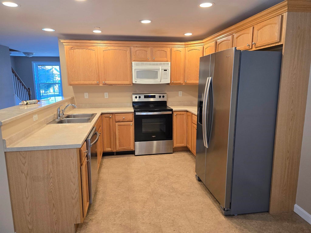 Photo of 33 Village Drive, Meredith, NH 03253 (MLS # 5114517)