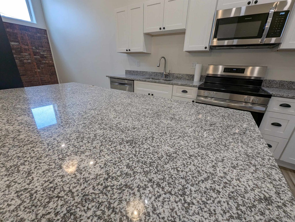 Photo of 22 South Main Street #202, Rochester, NH 03867 (MLS # 5093612)