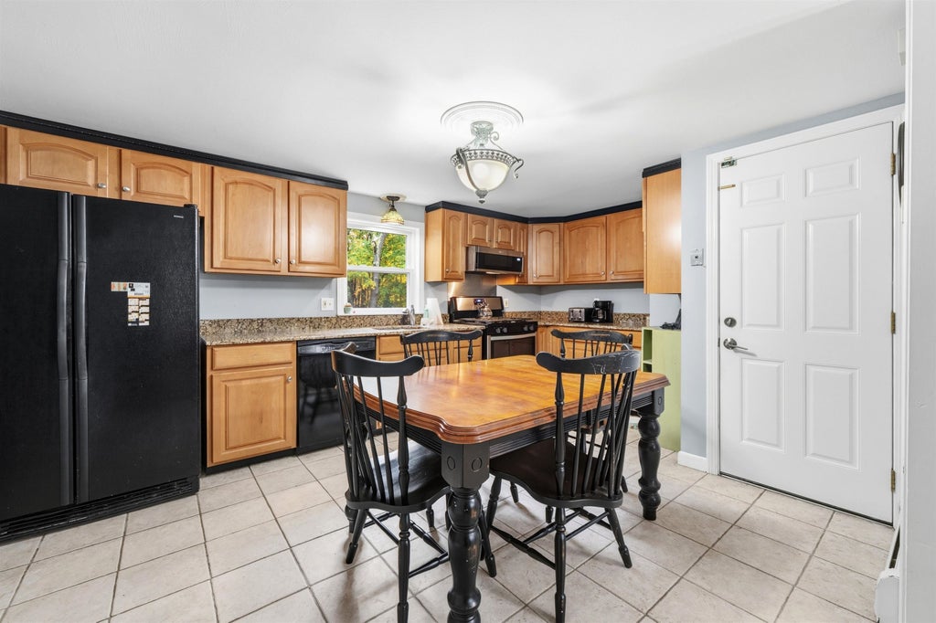 Photo of 4 Tate Street, Hudson, NH 03051 (MLS # 5115569)
