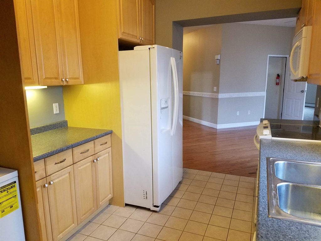 Photo of 585 Beech (north) Street #first floor, Manchester, NH 03104 (MLS # 5097436)