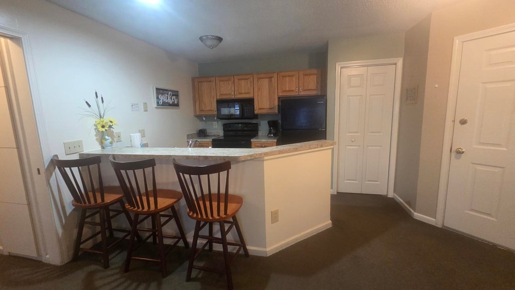 Photo of 156 Deer Park Drive #128TD, Woodstock, NH 03262 (MLS # 5113684)