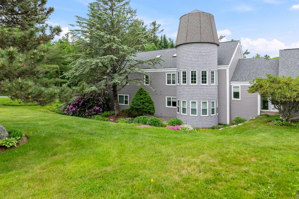 Photo of 128 Hilltop Place #128, New London, NH 03257 (MLS # 5093970)