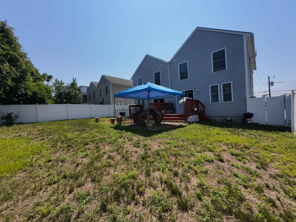 Photo of 211 W Mitchell Street, Manchester, NH 03103 (MLS # 5098597)