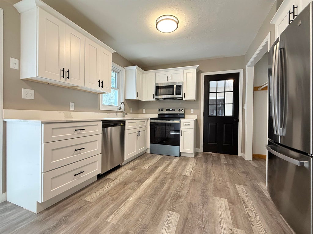 Photo of 67 Lafayette Street, Laconia, NH 03246 (MLS # 5111275)