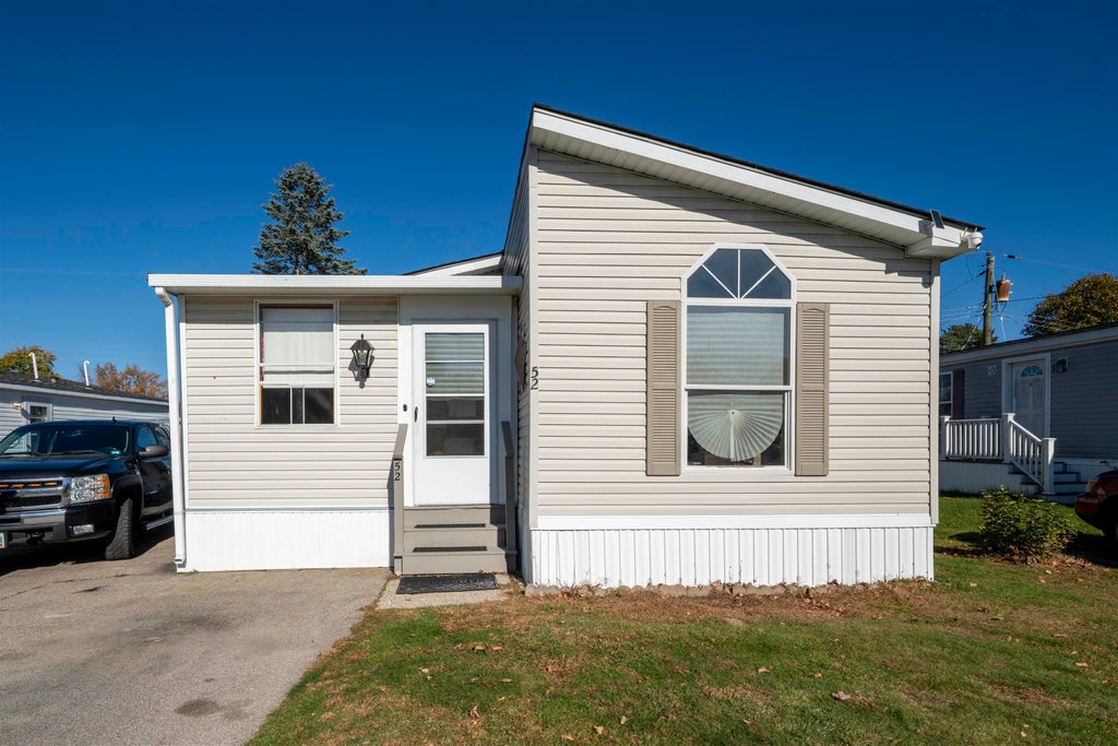 Photo of 30 Kendall Pond Road #52, Derry, NH 03038 (MLS # 5116088)