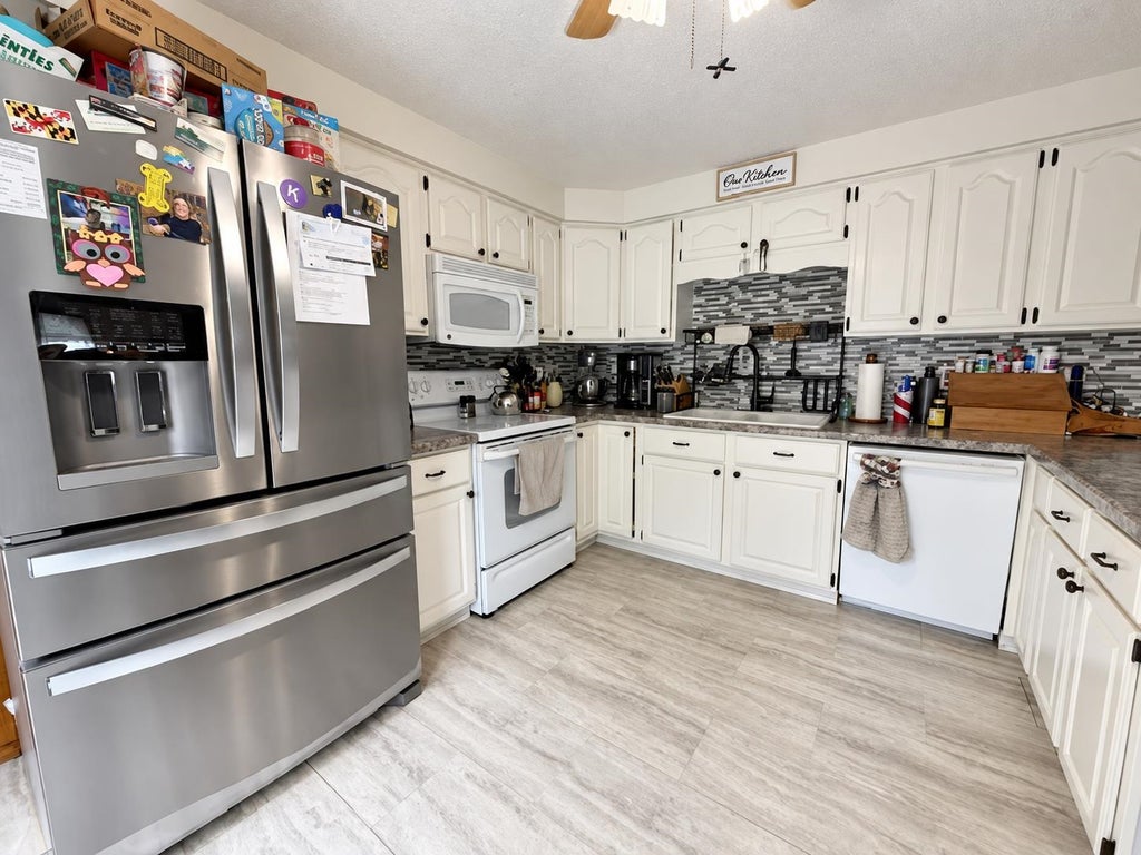Photo of 76 Wood Street, Berlin, NH 03570 (MLS # 5109099)