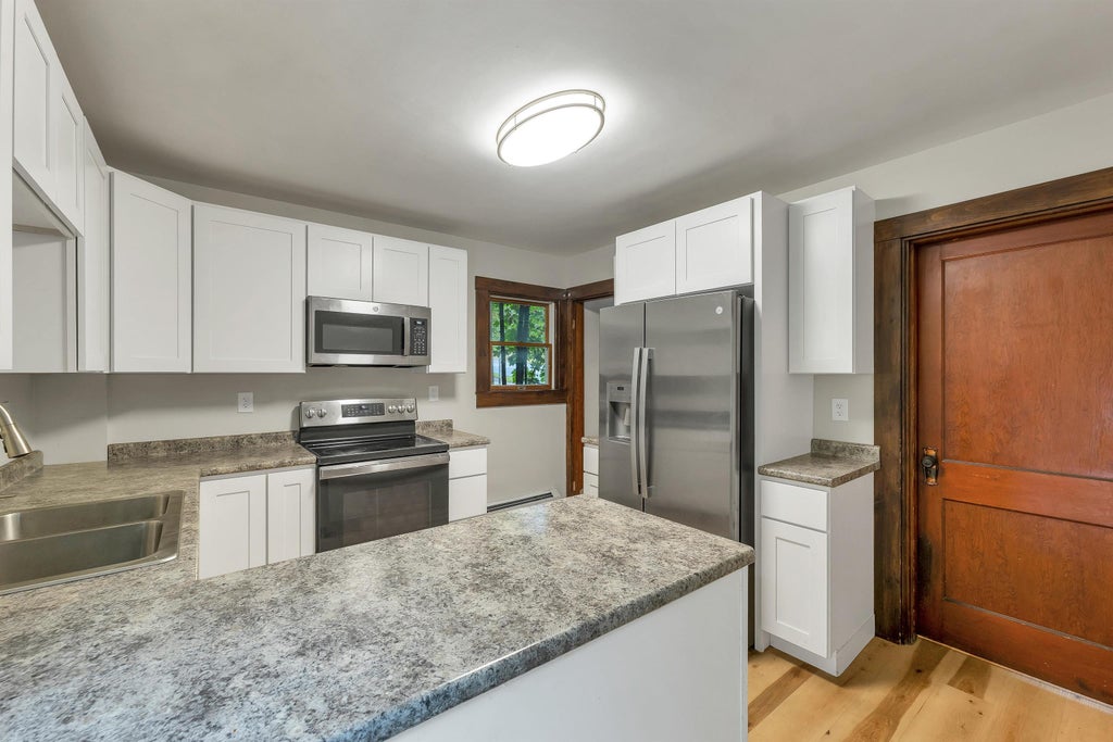 Photo of 58 Belvidere Street, Laconia, NH 03246 (MLS # 5109005)