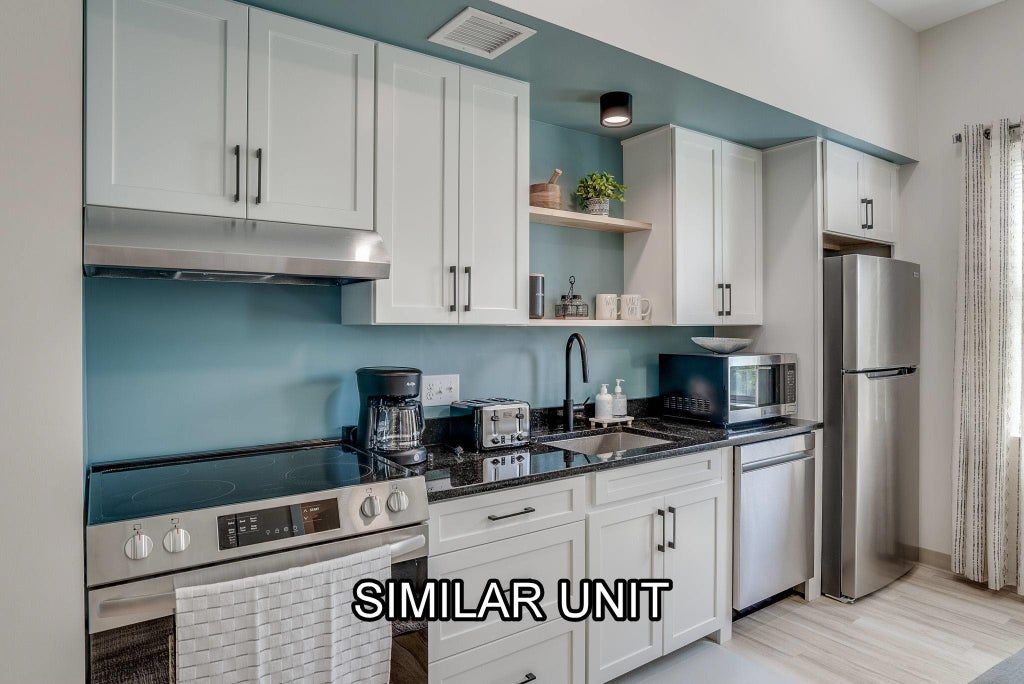 Photo of 4 Bridge Street #302, Nashua, NH 03060 (MLS # 5111305)