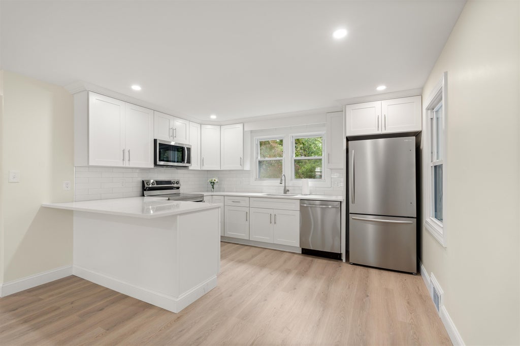 Photo of 8 Blue Hill Avenue #Unit A, Nashua, NH 03064 (MLS # 5113307)
