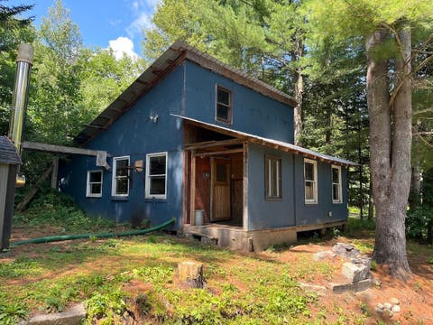Photo of 424 Howse Road, Coventry, VT 05825 (MLS # 5103629)