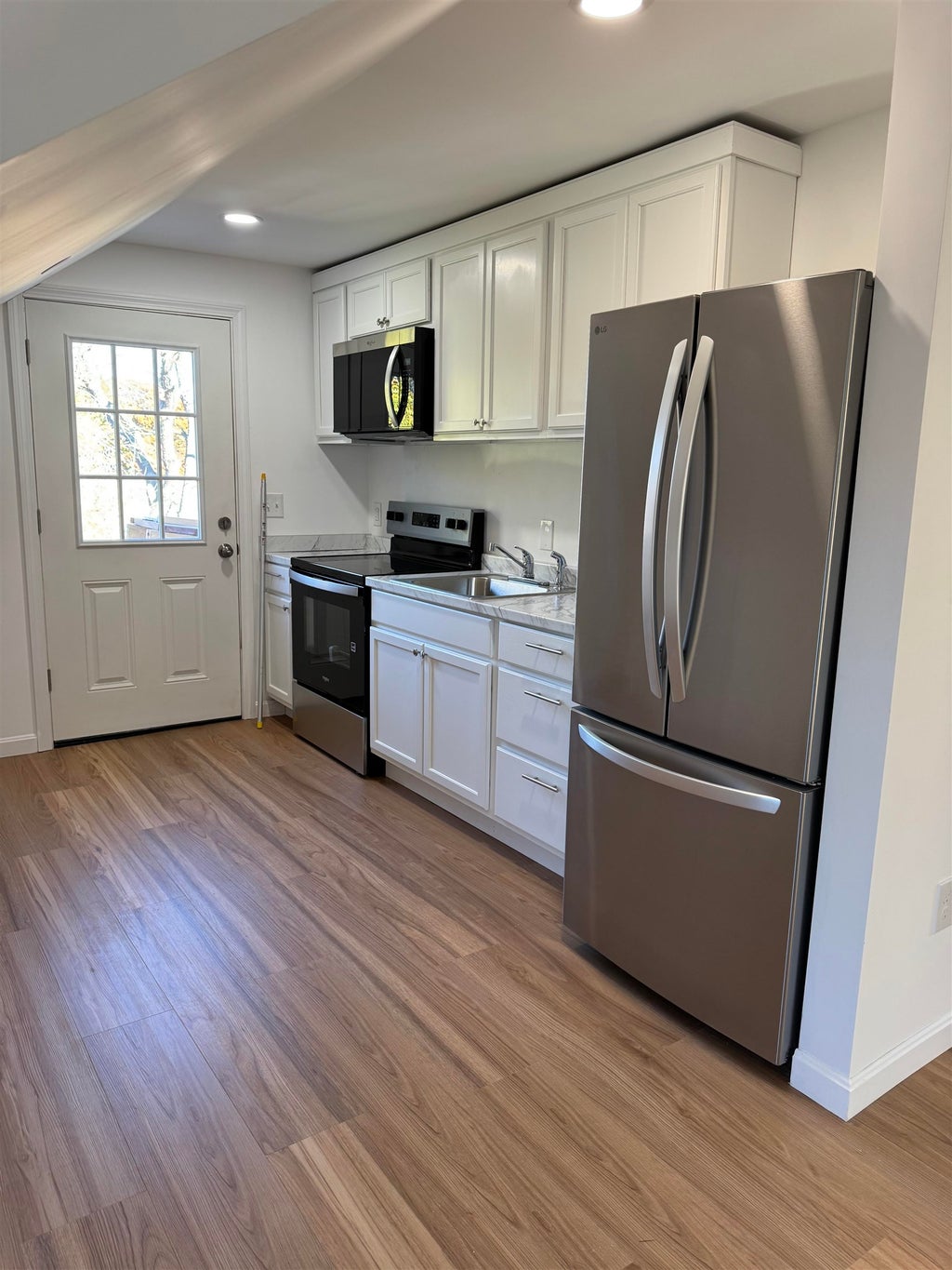 Photo of 247 West Mitchell Street, Manchester, NH 03103 (MLS # 5115642)