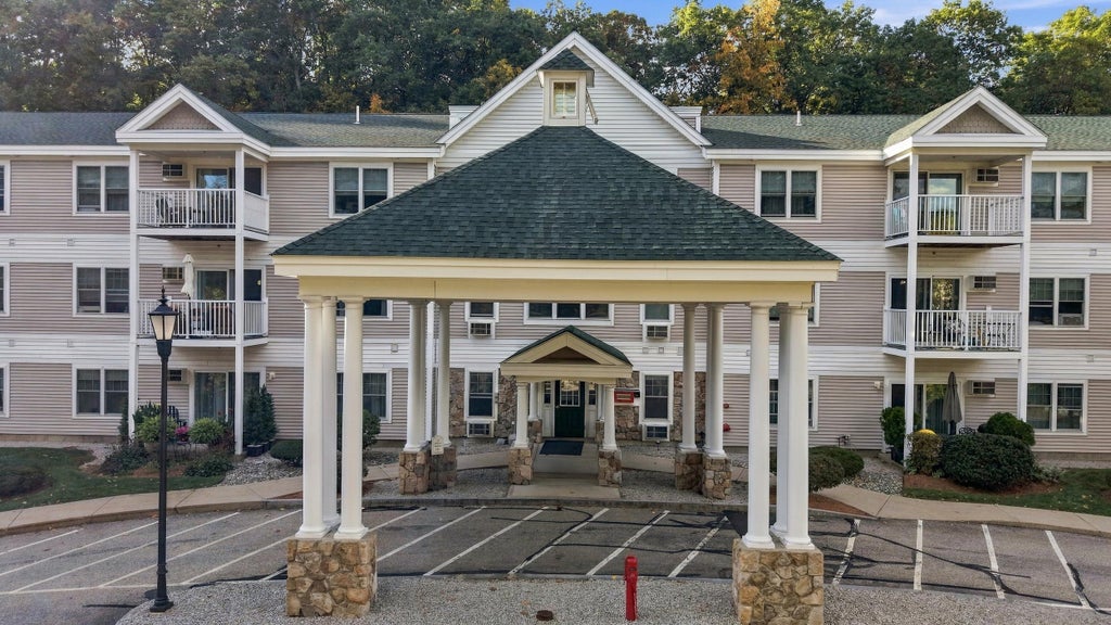 Photo of 245 Edward J. Roy Drive #218, Manchester, NH 03104 (MLS # 5114100)