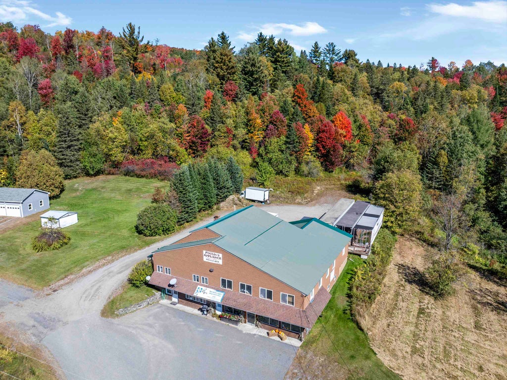 Photo of 102 Trooper Leslie G Lord Memorial Highway, Colebrook, NH 03576 (MLS # 5112639)