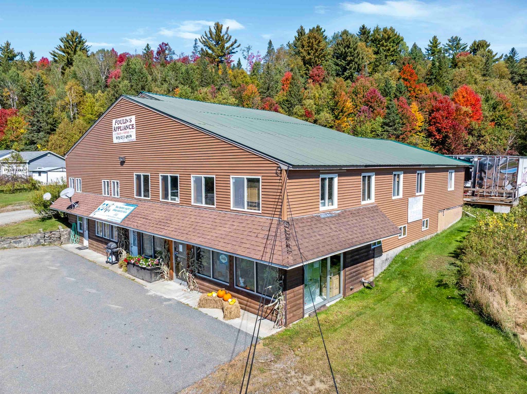 Photo of 102 Trooper Leslie G Lord Memorial Highway, Colebrook, NH 03576 (MLS # 5112639)