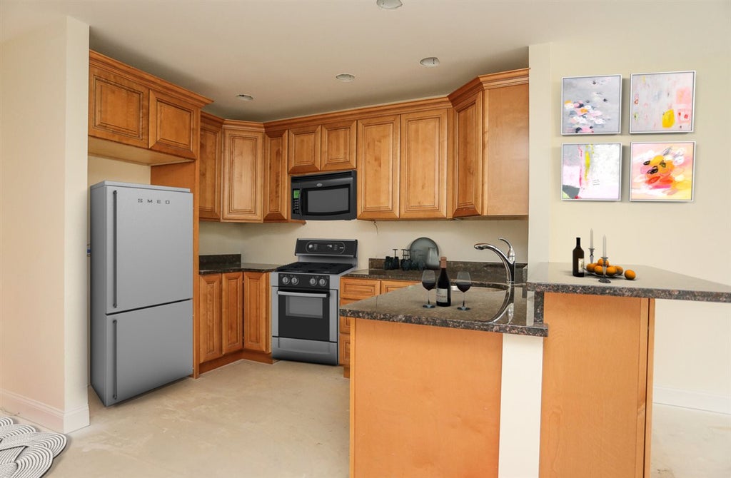 Photo of 19 Kendall Pond Road #204, Derry, NH 03038 (MLS # 5115030)