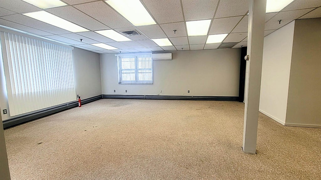 Photo of 97 Pleasant Street #Unit 2, Claremont, NH 03743 (MLS # 5104587)