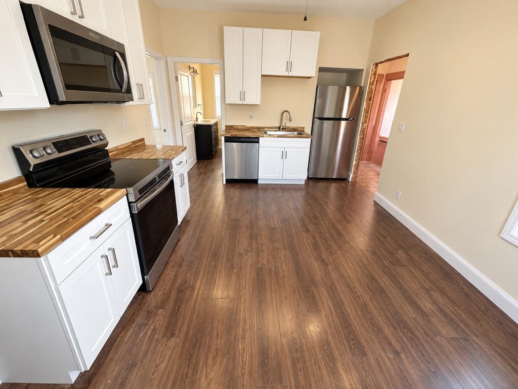 Photo of 153 Belmont Street, Manchester, NH 03103 (MLS # 5110954)