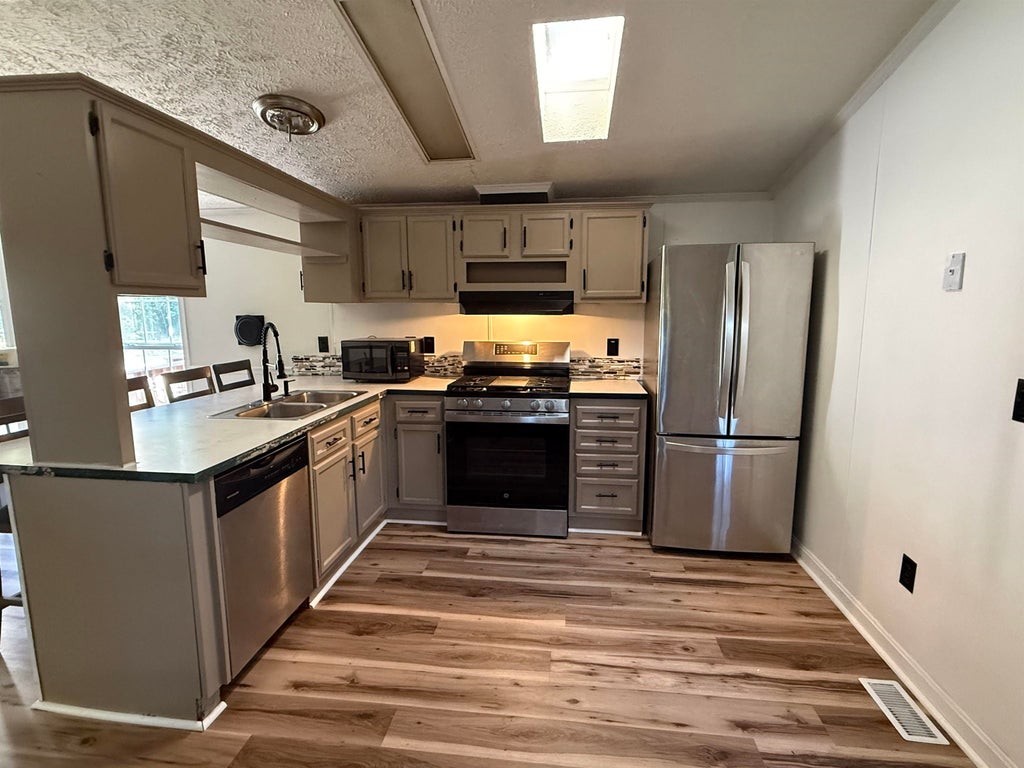 Photo of 18 Tee Dee Drive, Belmont, NH 03220 (MLS # 5108522)