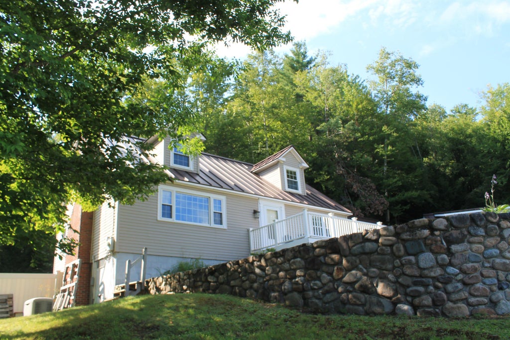 Photo of 57 Mountainside Road, Woodstock, NH 03262 (MLS # 5104119)