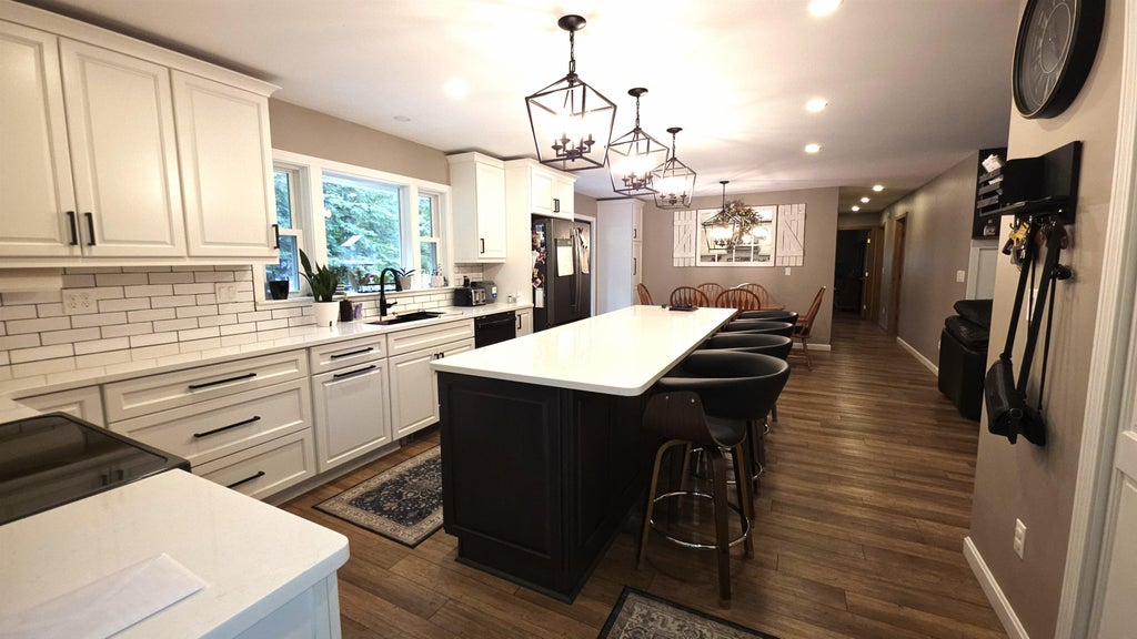 Photo of 11 Charron Avenue, Berlin, NH 03570 (MLS # 5094854)