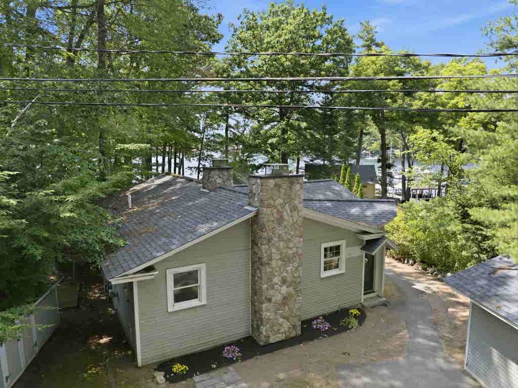 Photo of 19 Smith Cove Road, Gilford, NH 03249 (MLS # 5104864)