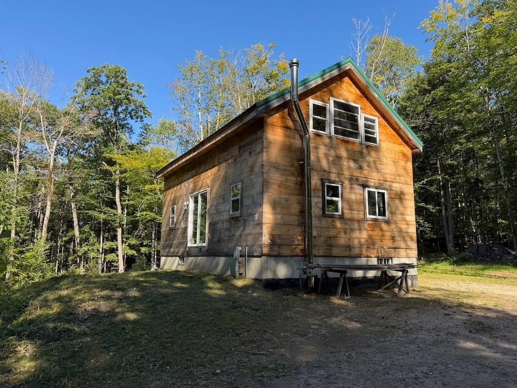 Photo of 275 Ossipee Mountain Road, Ossipee, NH 03814 (MLS # 5110090)