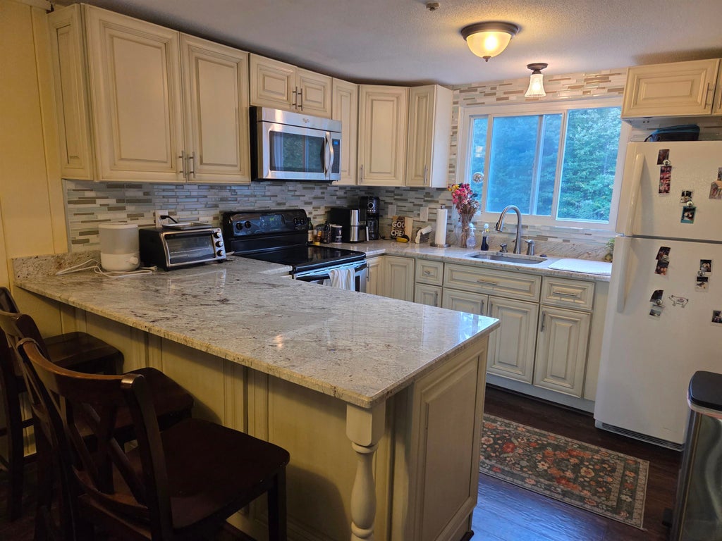 Photo of 22 Orris Road #F-1 Upper Unit, Thornton, NH 03285 (MLS # 5111388)
