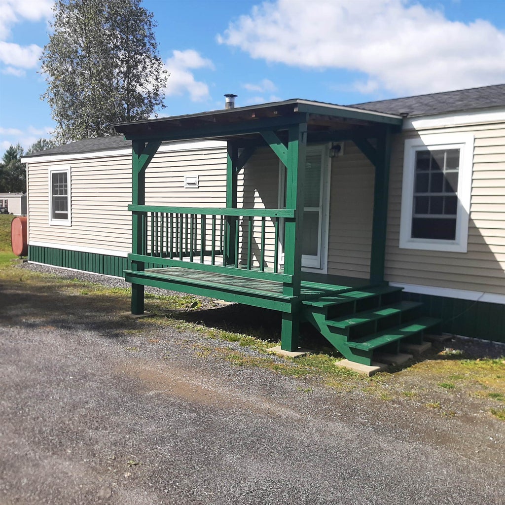 Photo of 18 Middle Road, Stewartstown, NH 03576 (MLS # 5109385)