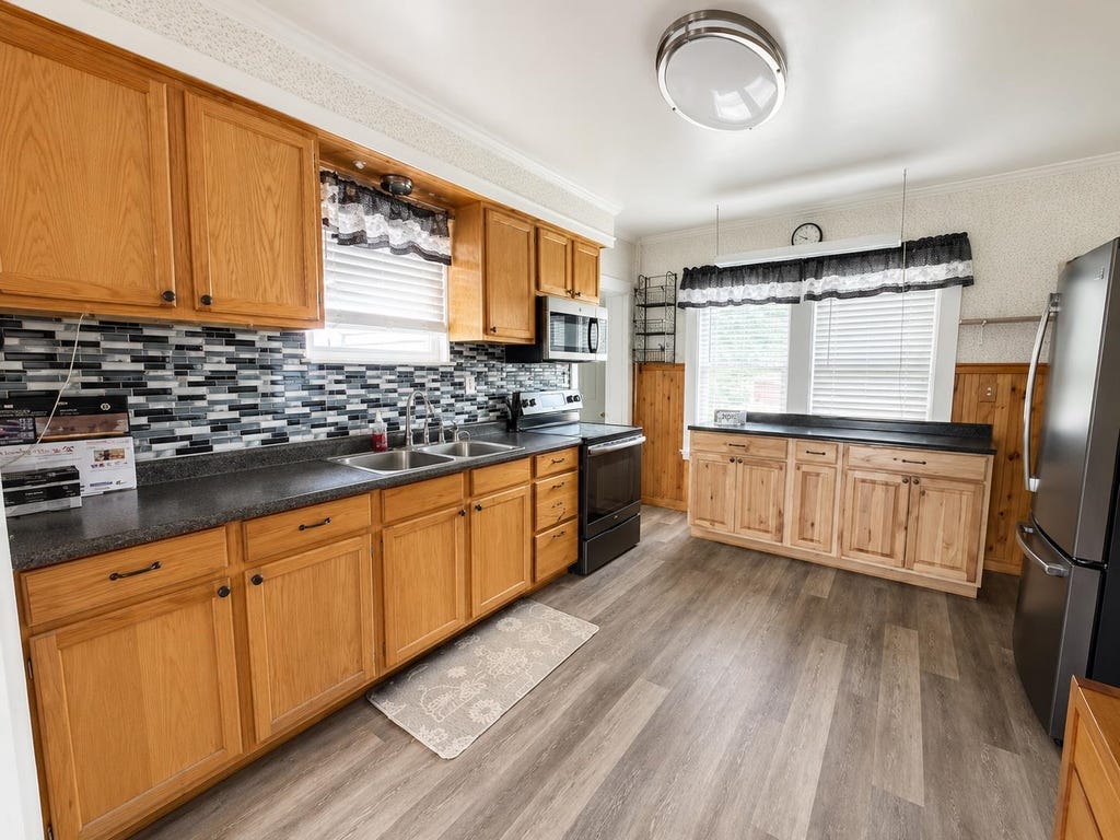 Photo of 213 Hillside Avenue, Berlin, NH 03570 (MLS # 5067858)