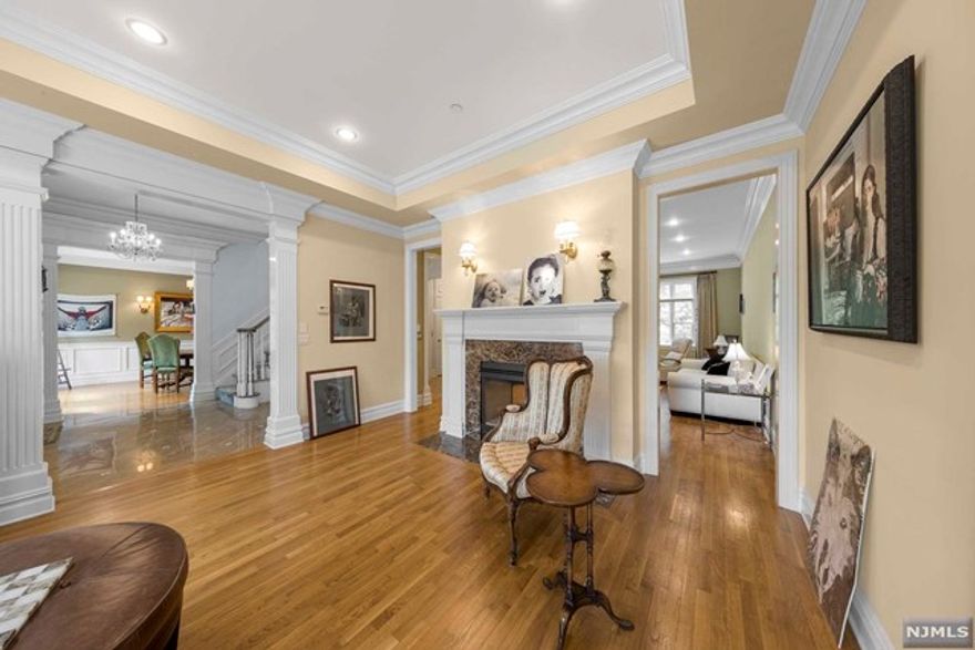 The VIRTUAL TOUR link for this listing contains an enormous amount of relevant information including a comprehensive video tour with hidden features & room dimensions, written description, additional photos, floor plans, and a complete interactive 3D model of the home. LOCATED IN THE AWARD WINNING TOWNHOME COMMUNITY ON THE EAST HILL. ESSEX MODEL WITH 2 STORY MARBLE FOYER, KITCHEN W/CUSTOM CABINETRY & SUB-ZERO & VIKING STST APPLIANCES, GRANITE COUNTERTOPS. MASTER SUITE HAS 2 WALK-IN CLOSETS, MARBLE BATH W/JACUZZI TUB. LOWER LEVEL FAMILY ROOM HAS FIREPLACE AND WALK OUT TO PATIO. 2 LEVELS OF OUTDOOR ENTERTAINING SPACE INCLUDING DECK AND COVERED PATIO. 2 CAR GARAGE, ELEVATOR TO ALL 3 LEVELS, CENTRAL VAC, CENTRAL AIR. 9 MINUTES FROM NYC.