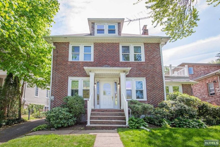 PERFECT RENTAL HOME IN TENAFLY! RENOVATED, CLASSIC BRICK COLONIAL ON DESIRABLE EAST HILL STREET. SPACIOUS LIVING ROOM WITH BUILT-IN SHELVES SURROUNDING THE FIREPLACE. MODERN WHITE KITCHEN WITH S/S APPLIANCES AND OVERSIZED COUNTERS OPEN TO THE DINING AREA. ALL ROOMS ARE LARGE WITH CROWN MOLDINGS AND HARDWOOD FLOORS THROUGHOUT. TWO FULL BATHS GUT RENOVATED A FEW YEARS AGO. PRIVATE DECK OFF UPSTAIRS BEDROOM AND FULL, FINISHED BASEMENT PROVIDE PLENTY OF SPACE TO RELAX. OVERSIZED DETACHED GARAGE AND PRIVATE BACKYARD WITH PATIO. LANDSCAPING INCLUDED IN RENT. TENANT RESPONSIBLE FOR SNOW REMOVAL. NO PETS. AVAILABLE 4/1. PER TENANT REQUEST, MASKS AND SHOES OFF PLEASE.