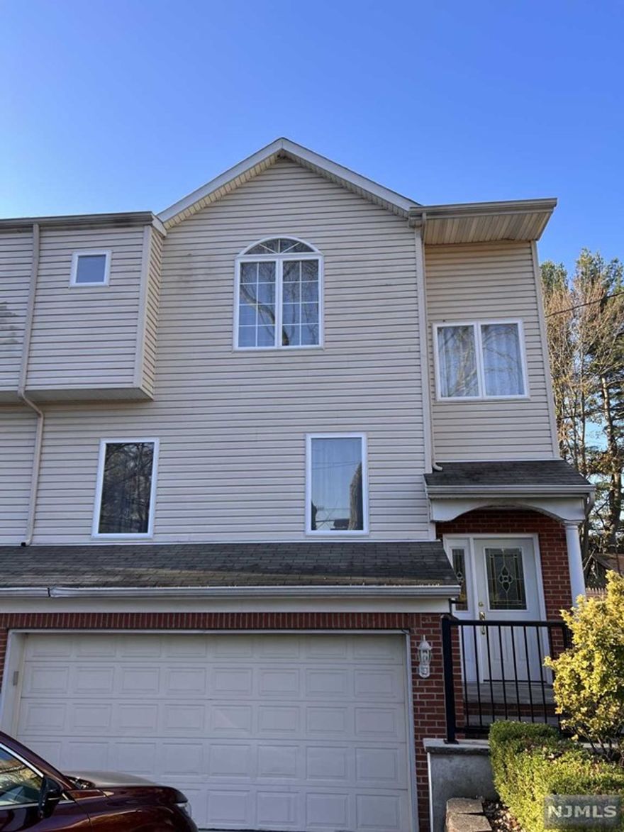 Custom built Duplex in 2000's with 4 bedrooms, 3.5 bathrooms, close to Elementary school, middle school and high school. Close to schools, shops and parks. Hardwood floors throughout. Freshly painted whole house. Brand new dishwasher and microwave in kitchen. Nice bright master bedroom with walk in closet and master bathroom. Two 2nd floor bedrooms with a newly updated full bathroom. Ground floor bedroom with its private full bathroom. Located in one of the top rated school district in Bergen Country, close to everything, with great living space and newly updated kitchen and bathrooms. Don't miss the chance. Owner holds NJ Real Estate License.