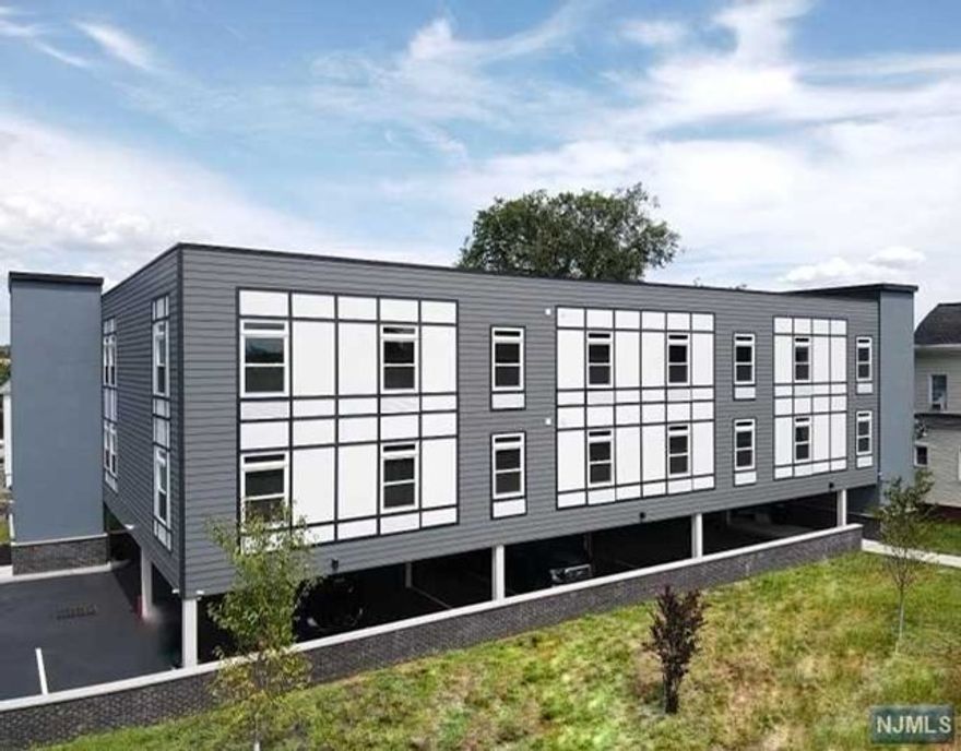 Brand new construction. Open layout, two bedroom apartment located steps away from the Essex train station to NYC. NJ Transit bus stop is conveniently located in front of the building. Two blocks from Hackensack University Hospital and one block to the Bergen County Courthouse. Close to restaurants, shopping, and more. The amenities are; Granite Countertops, Large Kitchen Islands with breakfast bar, Stainless Steel Appliances, Electric Oven, Microwave, Dishwasher, Refrigerator, Heat, and A/C combo GE wall units. Recessed Lighting, 9 Ft. Height Ceilings, Generous Closet Spaces, Hardwood Floors, and Ceramic Tile Floors, Laundry room in unit with hookups, Non Assigned 1 Parking Space, Elevator Building. All Utilities are Electric. The tenant Pays Electric and Water. 24 Hour Security Camera, Part Time Handyman, Driveway Entrance through John Street. Extra parking space available for $100/m. A small pet might be considered. A credit check and proof of income are required.