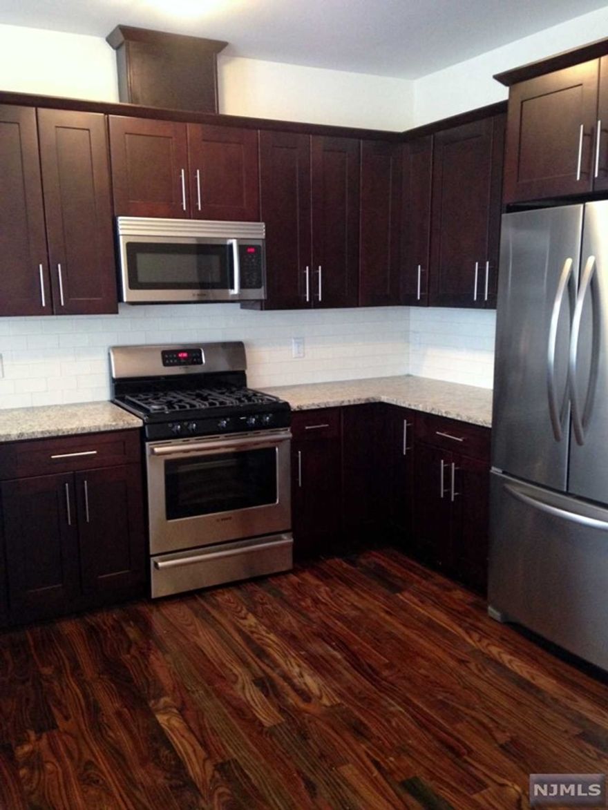 Modern 2 bedroom 2 bath 1,400 sq. ft. apartment for rent in luxury rental building. 1st floor unit with spacious floor plan, open layout, hardwood floors throughout, walk-in closets & washer/dryer in unit. Modern eat-in kitchen with granite counter-tops, stainless steel appliances and center island. Full baths with quartz counter-tops. Living room with sliding glass door to patio. Two assigned parking spaces and a private 250 sq. ft. storage unit included in the rent. Pre-wired for phone, cable TV and Wi-Fi. Prime Old Tappan location within blocks to Bi-State Shopping Plaza including CVS, deli, dry cleaner, shipping store, restaurants and other daily conveniences. Across the street from Old Tappan's blue ribbon Northern Valley Regional High School. Cats OK. Small dog subject to Landlord approval with Pet Bond. Flexible lease term: long or short-term OK. Owner is a licensed NJ Real Estate Broker. Available May 1st.