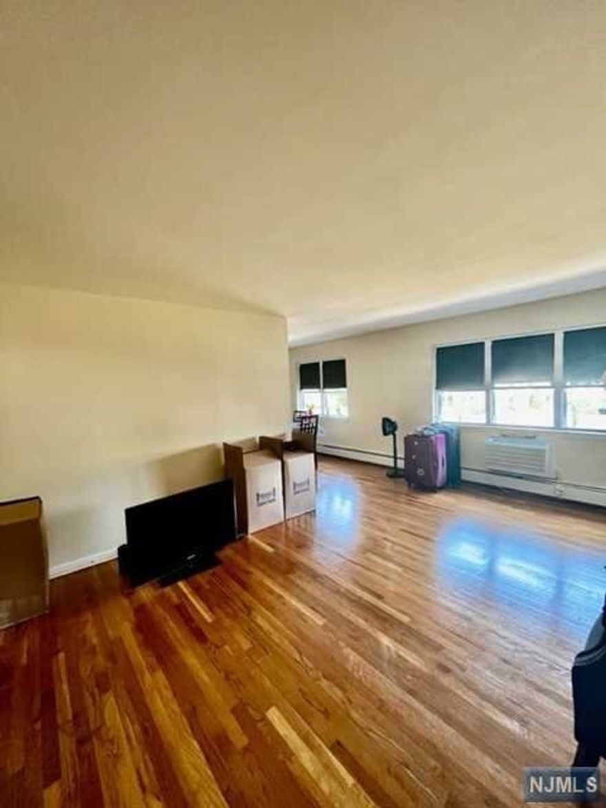 SECOND FLOOR IN GARDEN APARTMENT. HEAT AND HOT WATER INCLUDED.OFF STREET PARKING FOR ONE CAR. HARD WOOD FLOORS.