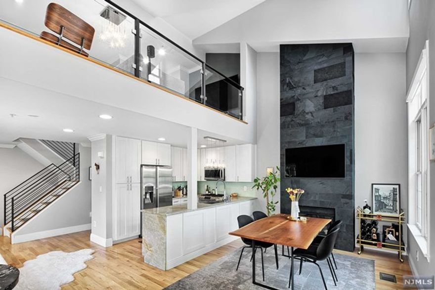 Bull's Ferry Chatham for rent! Coveted corner unit boasts abundant natural light from three sides and breathtaking views of NYC. Inside, discover a meticulously upgraded space featuring 2 bedrooms + loft and 2.5 bathrooms. Enjoy newly refreshed hardwood floors, a custom oversized fireplace, and new railings. Vaulted ceilings and expansive windows create an open, airy ambiance, with sunlight streaming in from the North, East, and South. State-of-the-art kitchen is a chef's delight, equipped with stainless steel appliances, custom cabinetry, and countertops. The master suite is a sanctuary, complete with a walk-in custom-built closet, an upgraded bathroom, and a private balcony. Loft area, enclosed in crafted glass wall can serve as family room, bedroom or office. Parking for two cars, one in garage and one in driveway. Community boasts two pools with jacuzzis, free shuttle to ferry and light rail. Steps to 158 bus to NYC. Close to restaurants and shopping. Must See!!