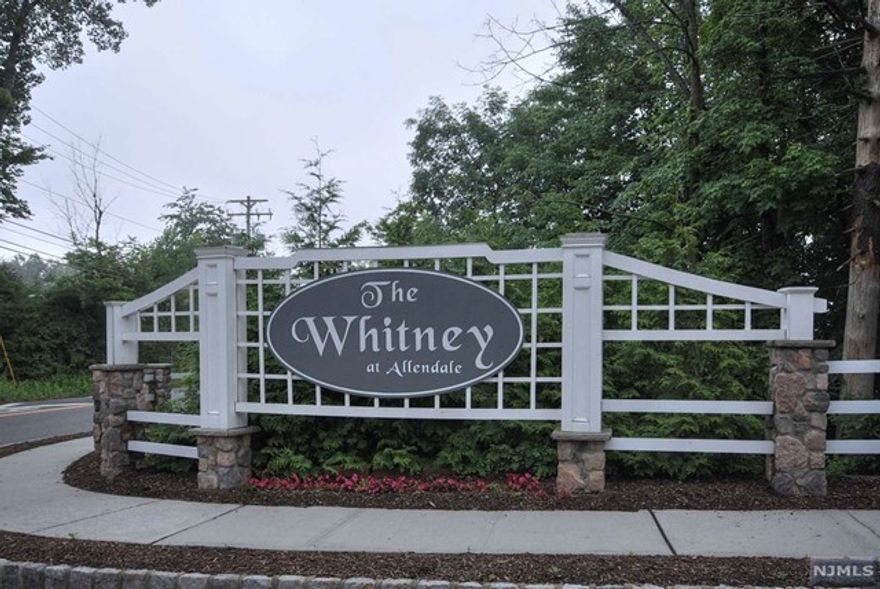 This pristine Whitney townhouse is loaded with upgrades and upscale finishes. With its oversized open floor plan, this home is perfect for entertaining. It includes a large island/breakfast bar, high end appliances, (including a wine fridge), tray ceilings, a Fireplace in the LR and beautiful wide plank flooring. Luxurious Primary Suite with a balcony, huge walk in closet, and a beautiful bathroom with jetted tub. Large laundry area with extra shelving for storage. Custom Lighting and Chandeliers throughout. Upgraded Cabinetry, quartz countertops and more...This one level home has 1775 square feet of living space plus 800 sq ft in the basement, perfect for home office, gym, playroom or storage. Wonderful lifestyle at the Whitney with its beautiful clubhouse, pool, playground and path to train and downtown Allendale. Truly a beautiful home, won't last!!!