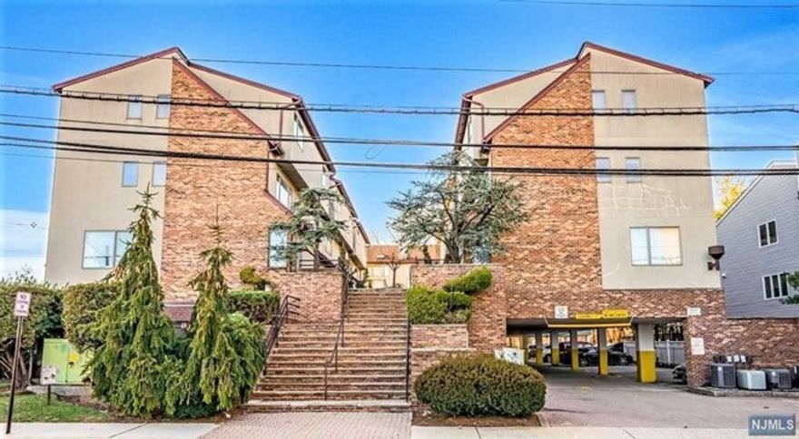 Location! Location! Location! Move right into this modern, bright and inviting one bedroom apartment home with LOW TAXES AND LOW MAINTENANCE conveniently located in the heart of Fort Lee New Jersey situated at East Hill Condominiums. This uniquely designed, corner unit living space boasts an inviting tiled entry foyer leading to a spacious living room with hardwood flooring, fireplace and sliding patio door leading to an enormous private balcony. Additional features include a modern kitchen and bathroom, a cozy, carpeted bedroom with custom closet, washer/dryer closet and car port space number 3. This is one of the best alternatives to NYC living and truly a MUST SEE! Kindly be advised that this development is NOT FHA Approved.