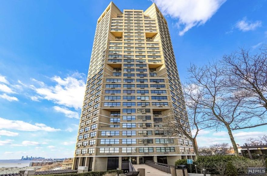 Luxury Doorman Building ** It's All About The View ** On the 33rd floor facing souths so it is Filled with Light and a Fabulous view of the Hudson River. Large Living Room One Bedroom with Renovated bathroom, galley kitchen. Bamboo floors, Parking $125 per mo. The maintenance includes ALL utilities, Heat, Hot/Cold Water, Gas, Electric, Air Conditioning. And All the Galaxy's full amenities!! Which Include: 24 hrs doorman, concierge service, indoor/outdoor pools, gym, community room, Convivence store, Easy Transportation to NYC.