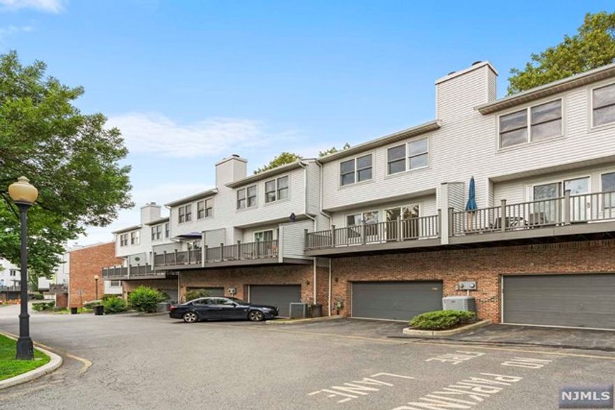 PANORAMA TOWNHOMES - This is a rare opportunity to rent a true 3-level townhouse with three bedrooms and a 2-car garage in the center of Edgewater just two blocks from Whole Foods, NJ Transit and the Edgewater Landing NY Waterways ferry. This quiet east facing approx.1,912 sq.ft. townhome offers convenient street level access to the main floor, a lower level with a recreation room and an upper floor with three bedrooms. Hardwood floor and recessed lighting throughout the entire unit and the kitchen and bathrooms have been beautifully recently updated. Additional details include a wood-burning fireplace, a lovely deck and your own garage & driveway. DUE AT LEASE SIGNING: 1st month rent, 1.5-month security, 1-month broker fee and $250 non-refundable move in fee. No smoking inside apt. Owner has NJ real estate license.