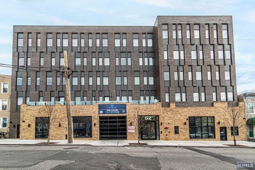 LANDLORD PAYS BROKER FEE 'CRYSTAL CAMBRIDGE' Welcome to Residence 10. This lovely 1-Bedroom 1-Bath unit boasts sleek modern kitchens fitted with top of the line stainless steel appliances. high ceilings, beautiful light oak hardwood floors, stainless steel appliances, quartz counters, washer & dryer in unit. Building amenities include, secure entrance, package room and fully equipped fitness center. This pet-friendly building ensures that your furry friends are not just accommodated but embraced in the heart of your home. This building is just blocks away from the PATH, Hoboken , and easy transportation to NYC. Parking is available for an additional fee. Elevate your lifestyle at Crystal Cambridge. Schedule a viewing today to experience the epitome of upscale urban living in Jersey City Heights. Your next chapter begins here! DUE AT LEASE SIGNING: 1st month rent, 1.5-month security Contact listing agent with appointment request Cynthia 201-282-8239