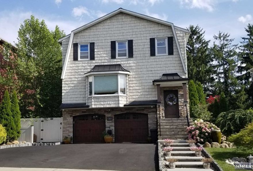 MOVE RIGHT IN! BEAUTIFULLY RENOVATED 3BR/2 FULL BATH apartment with open feel located on 2nd floor of immaculately maintained home. 1 BLOCK TO GANTNER ELEMENTARY SCHOOL & PARK. JUST 2 BLOCKS TO NYC EXPRESS BUS! SLEEK MODERN EAT-IN-KITCHEN with NEWER SS APPLIANCES features wide pass-through to HUGE living room & adjacent dining room. Plenty of natural light. LARGE MASTER BR w/2 large closets & DESIGNER BATH (granite vanity). BEAUTIFUL MAIN BATHROOM. WASHER/DRYER FOR TENANT ON GROUND FLOOR. CENTRAL A/C. INCLUDES 2 PARKING SPOTS. ENJOY USE OF PRIVATE YARD. Intercom/security surveillance system. Attic storage. No use of garage. Additional space may also be available for increased rent to accommodate extended family. EASY ACCESS TO MAJOR HIGHWAYS. Landlord responsible for lawn maintenance & tenant responsible for snow removal and first $100 of repairs. NON-SMOKING. Small pets considered. NTN credit report (700+ minimum credit), proof of income/interview required for each adult occupant